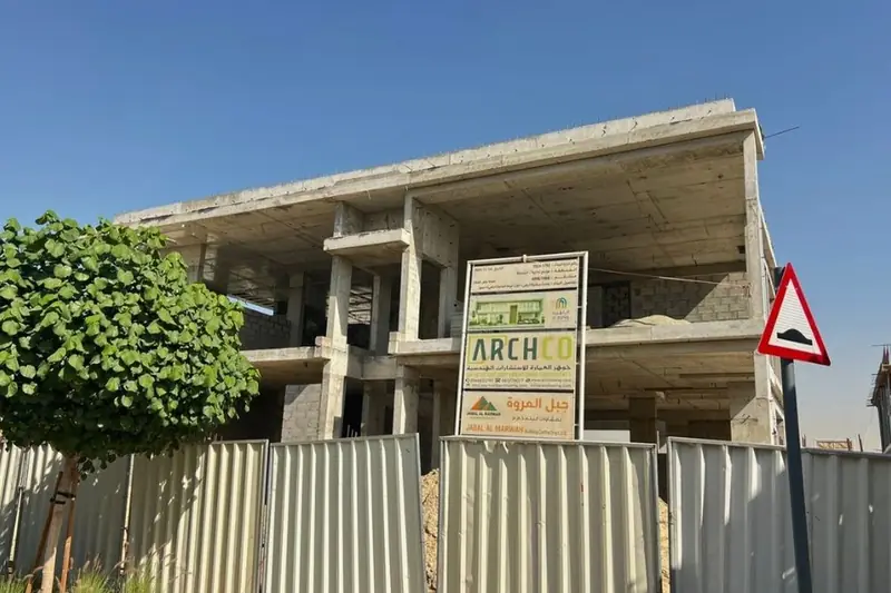 Two-storey villa structure with project signboard, Al Zahia Sharjah