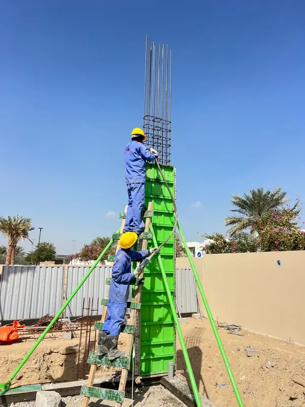 Site team fixing column formwork on a Jabal Al Marwah villa project